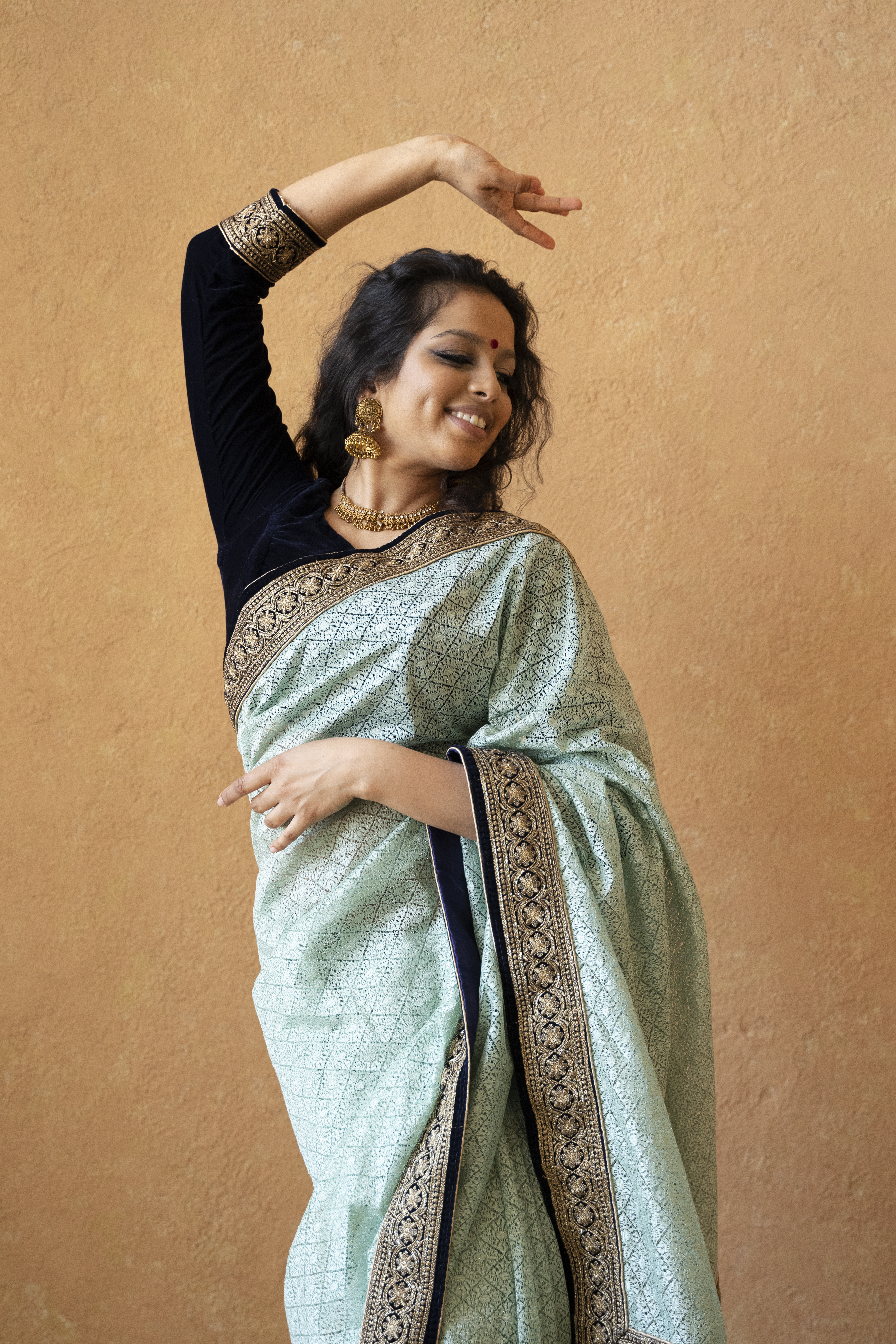 “Drape the tradition, own the style.”